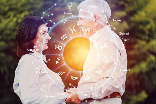 How Your Horoscope Can Help You Prepare for Major Life Events 3 Happy couple holding hands with glowing zodiac wheel astrology illustration.